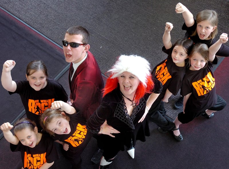 A performance of "We Will Rock You" at Southmoor School. Pictured in 2012 were John Appleton as Khashoggi and teacher Anne Twine as the Killer Queen with her assistants played by Year 5 pupils from Hill View Junior School; Natasha Hair, Josie Appleby, Emma Bell, Grace Kennedy, Faye Potts and Gracie Mitchell..