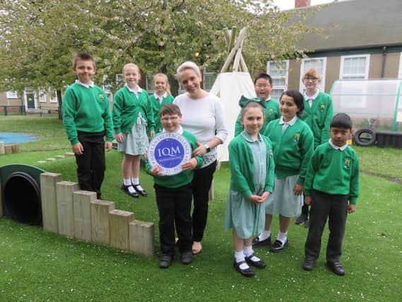 West Rainton Primary School deputy head Susan Firth with pupils from Years 2-6.