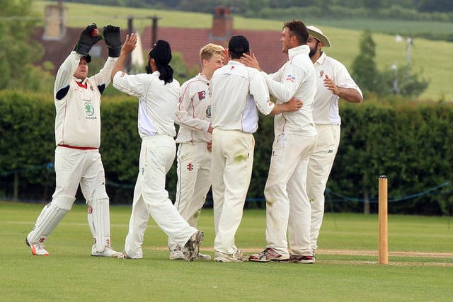 Welbeck bowler Richard Stroh gets a wicket.against Farnsfield CC in May 2013.