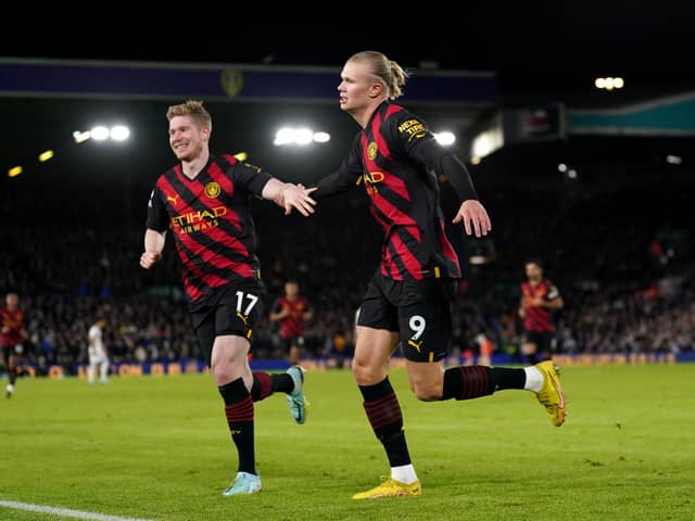 Manchester City's Erling Haaland (right) celebrates scoring their side's second goal of the game during the Premier League match at Elland Road, Leeds.
