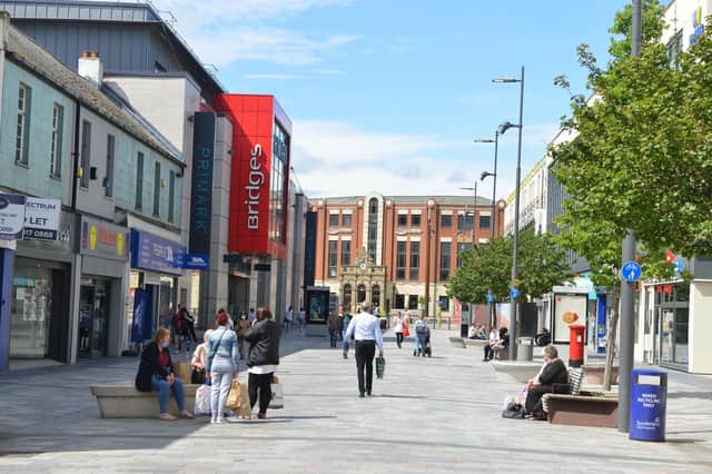 Social distancing barriers were removed from High Street West in May this year.