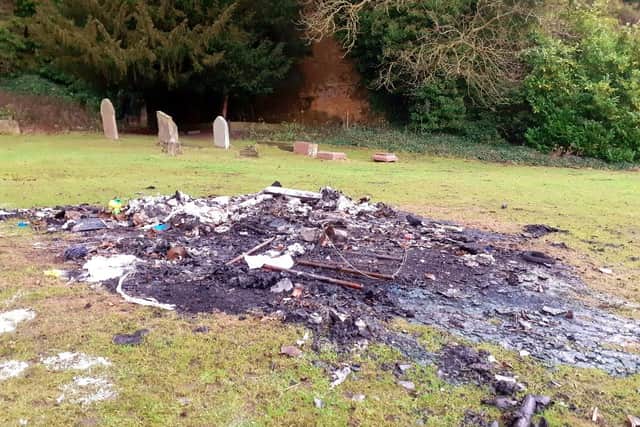 Fly tippers are thought to have had a bonfire party at the cemetery