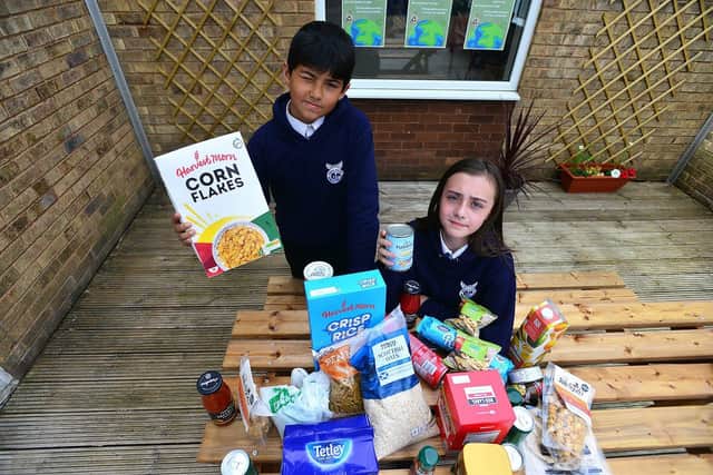 South Hylton Academy pupils Spencer Johnson and Layla Patrickson, both 11, have been bagging up the items of surplus food to redistribute to those in need in the local community.

Picture by FRANk REID