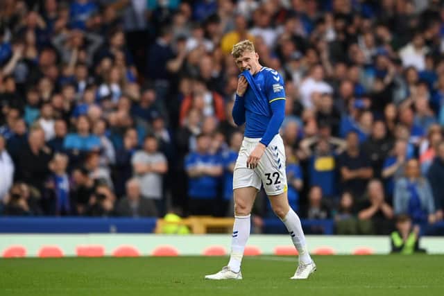 LIVERPOOL, ENGLAND - MAY 15: Jarrad Branthwaite of Everton leaves the field after receiving a red card from Referee Michael Oliver during the Premier League match between Everton and Brentford at Goodison Park on May 15, 2022 in Liverpool, England. (Photo by Gareth Copley/Getty Images)