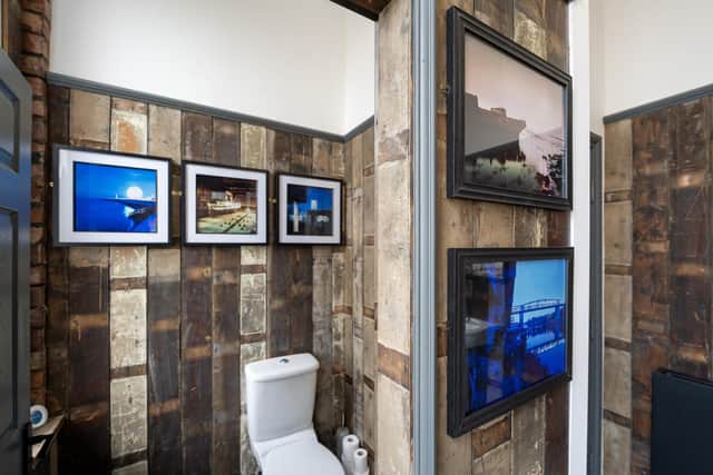 Andy Martin's atmospheric photographs of local scenes in the men's toilets