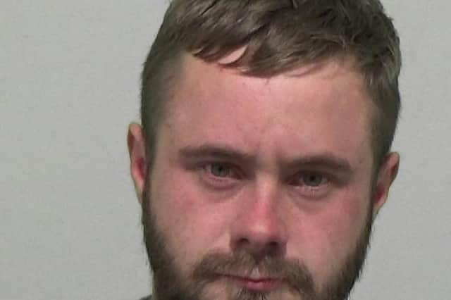 Rolfe, 30, of no fixed address, pleaded guilty to robbery and having a bladed article. Judge Julie Clemitson said he posed "a risk to other people" and sentenced him to four years behind bars with a two year extended licence period