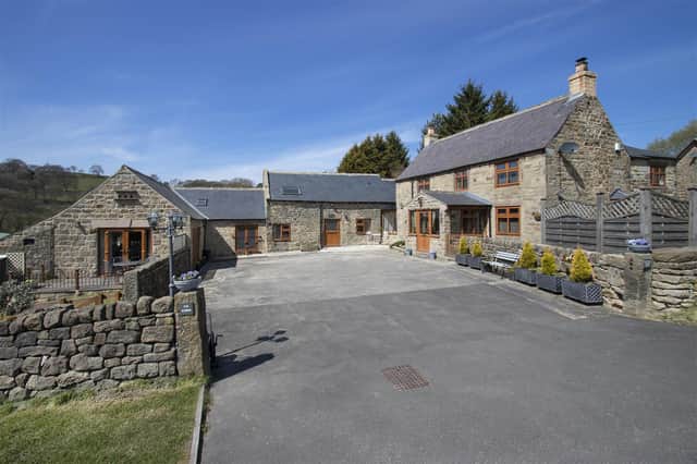 The property comprises a three-bedroom home, two-bedroom annexe and self-contained two-bedroom holiday cottage.