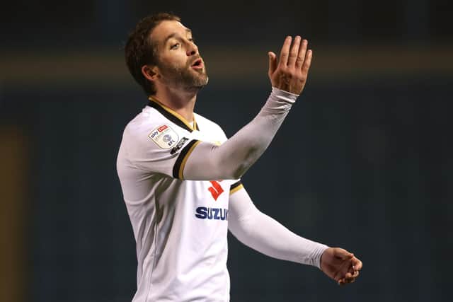 Will Grigg of Milton Keynes Dons reacts during the Sky Bet League One match between Gillingham and Milton Keynes Dons at MEMS Priestfield Stadium.