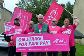 BT Customer Service Engineer Ian Hammond (front) is demanding a "fair" pay increase more in line with the rise in the cost of living.