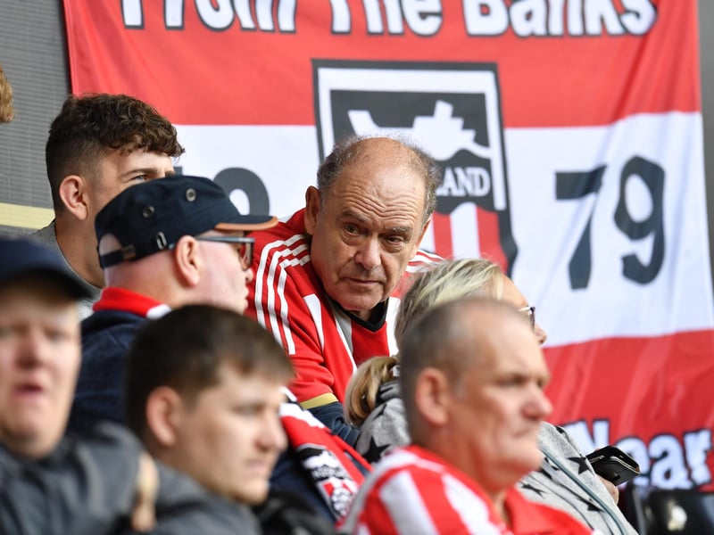 Sunderland supporters in action away from home in Wales at the Liberty Stadium against Swansea City in the Championship.