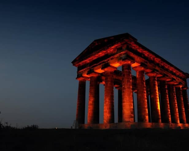 Penshaw Monument lit up red in support of Wear it Red Day back in 2025.