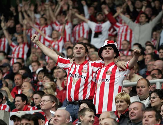 Sunderland fans celebrate their 1-0 victory and the championship after the Championship match between Sunderland and Stoke City at the Stadium of Light on May 8, 2005.