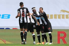 The Newcastle United players celebrate a goal in the 3-0 win over Sheffield United.
