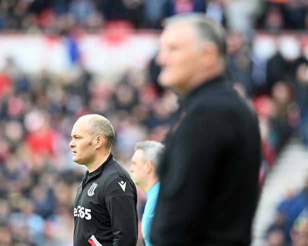 Alex Neil and Tony Mowbray watch on at the Stadium of Light