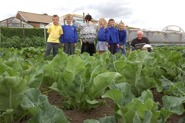 Gardener Tom Race was showing his North Lea allotment to primary school children when this photo was taken in 2007. Liam Hepburn, David Ross, Megan Porteous, Matthew Simpson, and Jack Sanders were all in the picture.