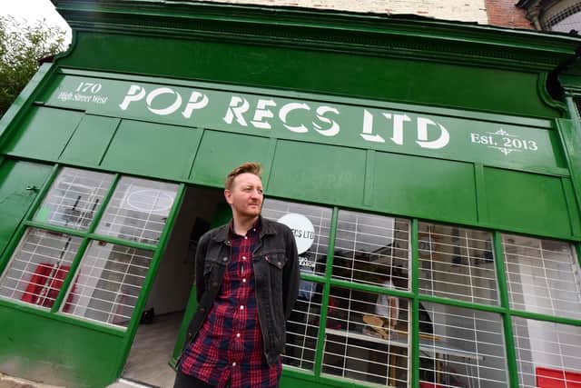 Dave Harper at the new Pop Recs in High Street West in its early days