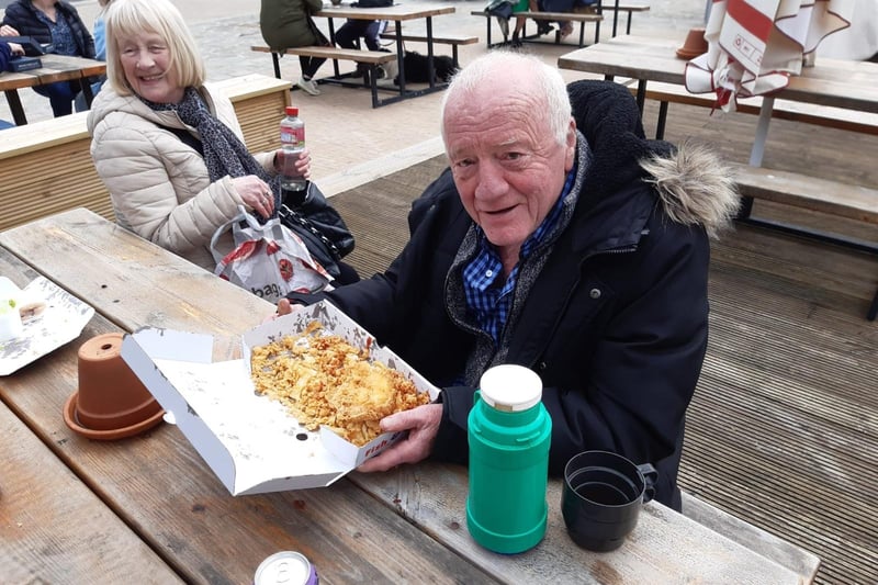 Peter Taylor, 72, with a hot flask of tea to wash down his fish and chips.