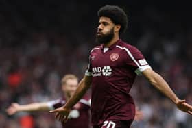 GLASGOW, SCOTLAND - APRIL 16: Ellis Simms of Heart of Midlothian celebrates after scoring their team's first goal during the Scottish Cup Semi Final match between Heart Of Midlothian FC and Hibernian FC at Hampden Park on April 16, 2022 in Glasgow, Scotland. (Photo by Ian MacNicol/Getty Images)