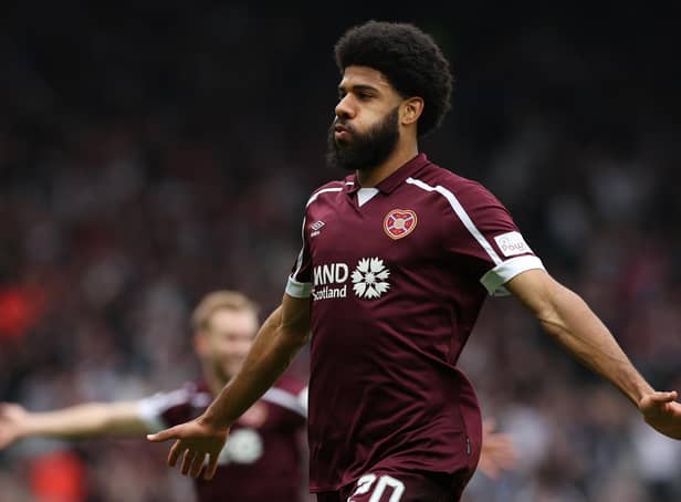 GLASGOW, SCOTLAND - APRIL 16: Ellis Simms of Heart of Midlothian celebrates after scoring their team's first goal during the Scottish Cup Semi Final match between Heart Of Midlothian FC and Hibernian FC at Hampden Park on April 16, 2022 in Glasgow, Scotland. (Photo by Ian MacNicol/Getty Images)
