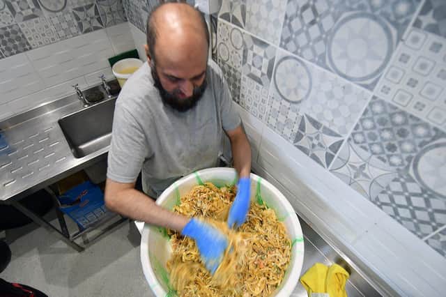 Onion Bhaji being mixed at the Big Fat Indian Kitchen at the Stack, Seaburn.  Picture by FRANK REID.