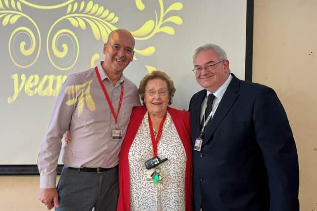 Pictured from left is Stephen Jones, head teacher, Brenda Bradshaw, dinner lady, and Simon Tate, chair of governors.