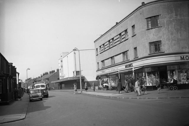 Who's up for a trip to the cinema. Here is the Marina in 1961, right next to Moore's.