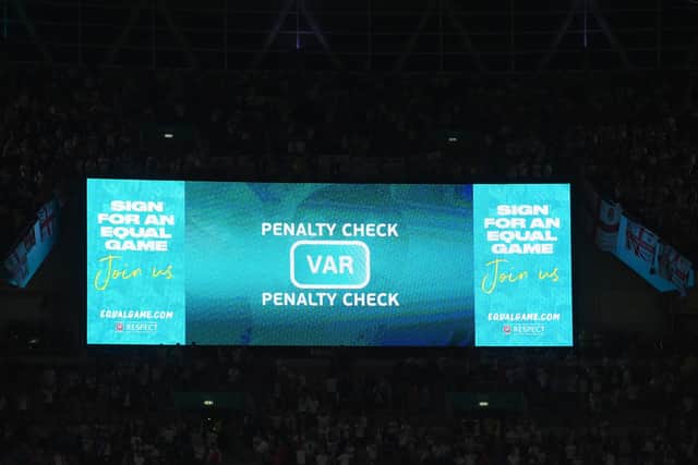LONDON, ENGLAND - JULY 07: A general view inside the stadium as the LED screen displays a VAR check is underway for a potential penalty to England during the UEFA Euro 2020 Championship Semi-final match between England and Denmark at Wembley Stadium on July 07, 2021 in London, England. (Photo by Laurence Griffiths/Getty Images)