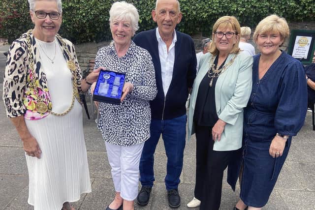 The Mayor of South Tyneside Councillor Pat Hay (left) presents a gift to Fran and Peter Hooper from the Village Cafe, Whitburn to mark their 50th year in business. As The Mayoress Mrs Jean Copp. 2nd left and the Leader of South Tyneside Council Councillor Tracey Dixon look on. Picture by FRANK REID