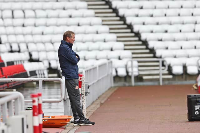Sunderland boss Phil Parkinson watches the Carlisle United friendly.