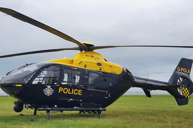 Three suspected bogus builders have been arrested after officers tracked their car using a police helicopter.