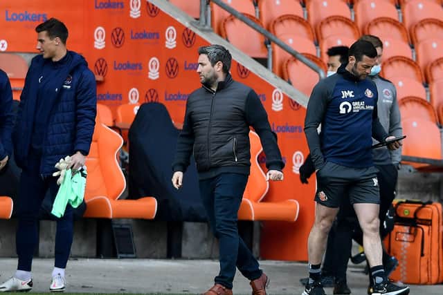 Lee Johnson watches on at Blackpool