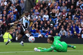 Newcastle United's Allan Saint-Maximin has a shot against Burnley's Nick Pope on the final day of last season.