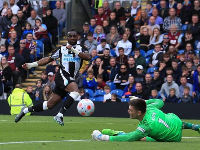 Newcastle United's Allan Saint-Maximin has a shot against Burnley's Nick Pope on the final day of last season.