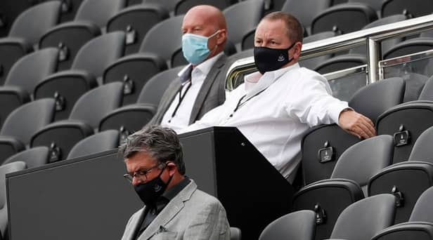 Newcastle United's English owner Mike Ashley (R) watches the English Premier League football match between Newcastle United and Brighton and Hove Albion at St James' Park in Newcastle upon Tyne, north-east England on September 20, 2020.