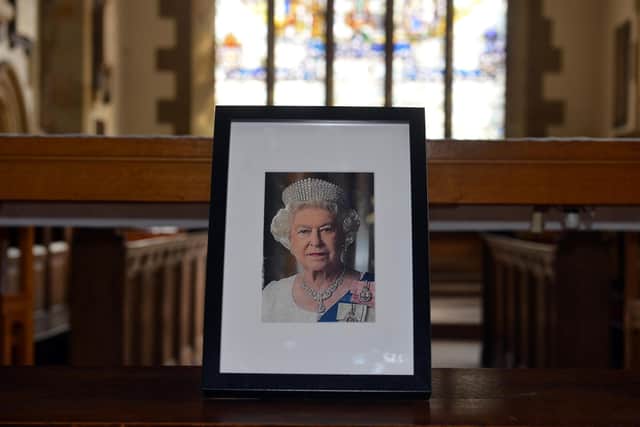 A framed photograph in Sunderland Minster of Queen Elizabeth II.