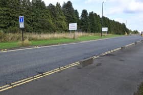 A man has been arrested after a cyclist died following a collision with a car in Nissan Way, Washington, on Friday.