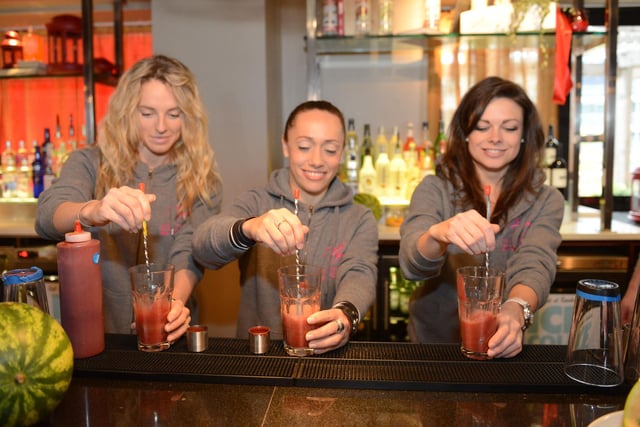 The cast of Dirty Dancing making cocktails at Revolution, in Low Row. Left to right in 2015 were Carlie Milner, Sarah Cortez and Verity Jones.