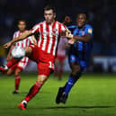 GILLINGHAM, UNITED KINGDOM - AUGUST 22:  Donald Love of Sunderland battles for posession with Regan Charles-Cook of Gillingham during the Sky Bet League One match between Gillingham and Sunderland at Priestfield Stadium on August 22, 2018 in Gillingham, United Kingdom.  (Photo by Naomi Baker/Getty Images)