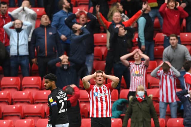 Charlie Wyke and Sunderland fans react after Wyke had missed a first-half chance during the Sky Bet League One play-off semi-final.