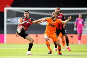Nabil Bentaleb of Newcastle United and Philip Billing of Bournemouth battle for possession  during the Premier League match between AFC Bournemouth and Newcastle United at Vitality Stadium on July 01, 2020 in Bournemouth, England.