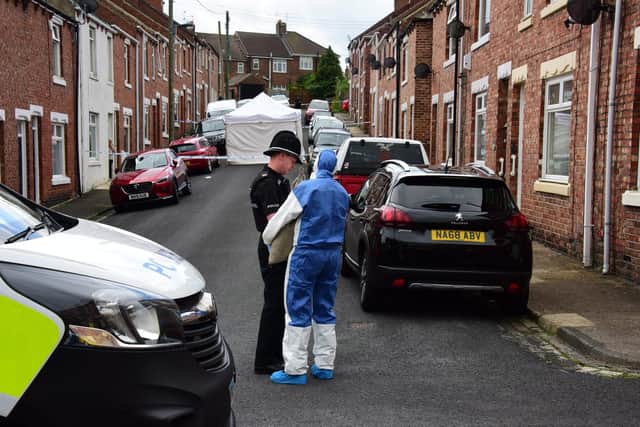 Police forensic officers survey the scene in Melville Street in Chester-le-Street.