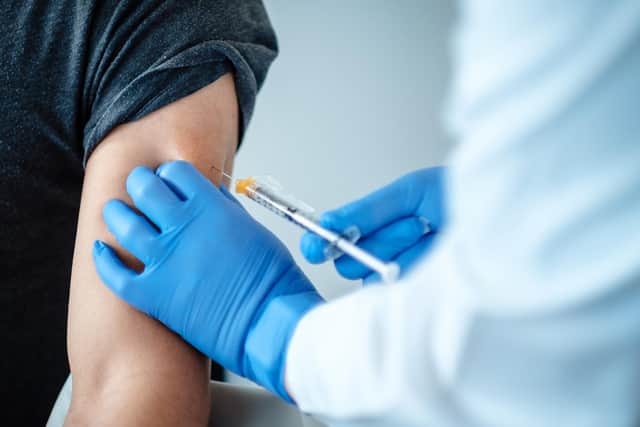 An image shared by BioNTech of a patient being given a dose of a coronavirus vaccine. Elderly people in care homes and their carers are top of the list to receive a Covid-19 vaccine after the UK became the first country in the world to approve a jab from Pfizer and BioNTech.