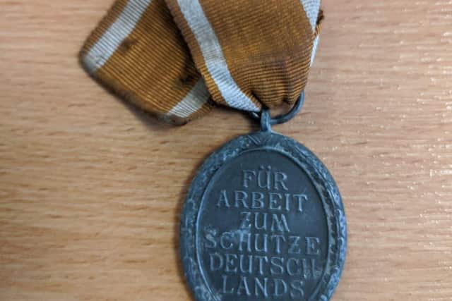 One of the medals found by Durham Constabulary is a German West Wall medal.