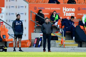 Lee Johnson watches on at Blackpool