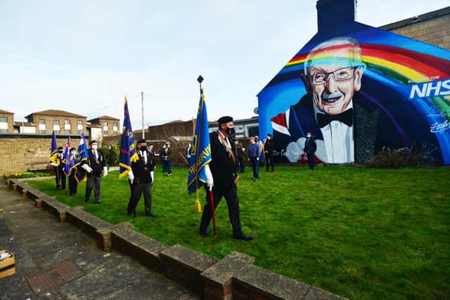 Standard bearers march into position for the start of the unveiling of the Sir Tom Moore mural Picture by FRANK REID
