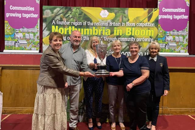 Washington Village in Bloom Group with their Best Overall Entry trophy at the Northumbria in Bloom awards 2021.