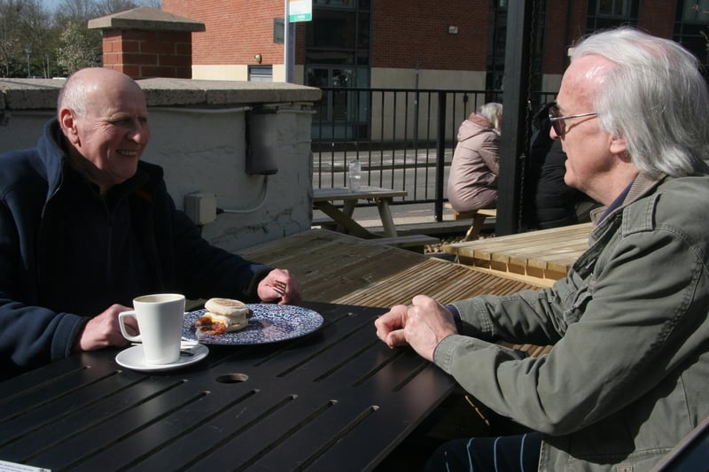 Paul Burgess and Jan Score enjoying breakfast in the sunshine at The Portland, West Bars