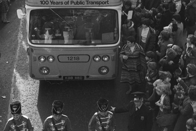 A marching band leads the parade bus through Sunderland in 1978. Are you in the crowds?