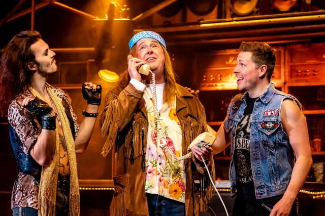 Kevin Kennedy, centre, as Dennis Dupree in Rock of Ages.