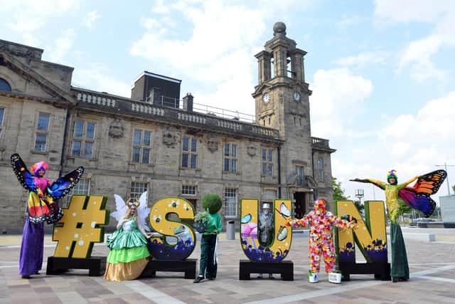 Enchanted Garden Trails characters at Keel Square as part of #SUN letters reveal.